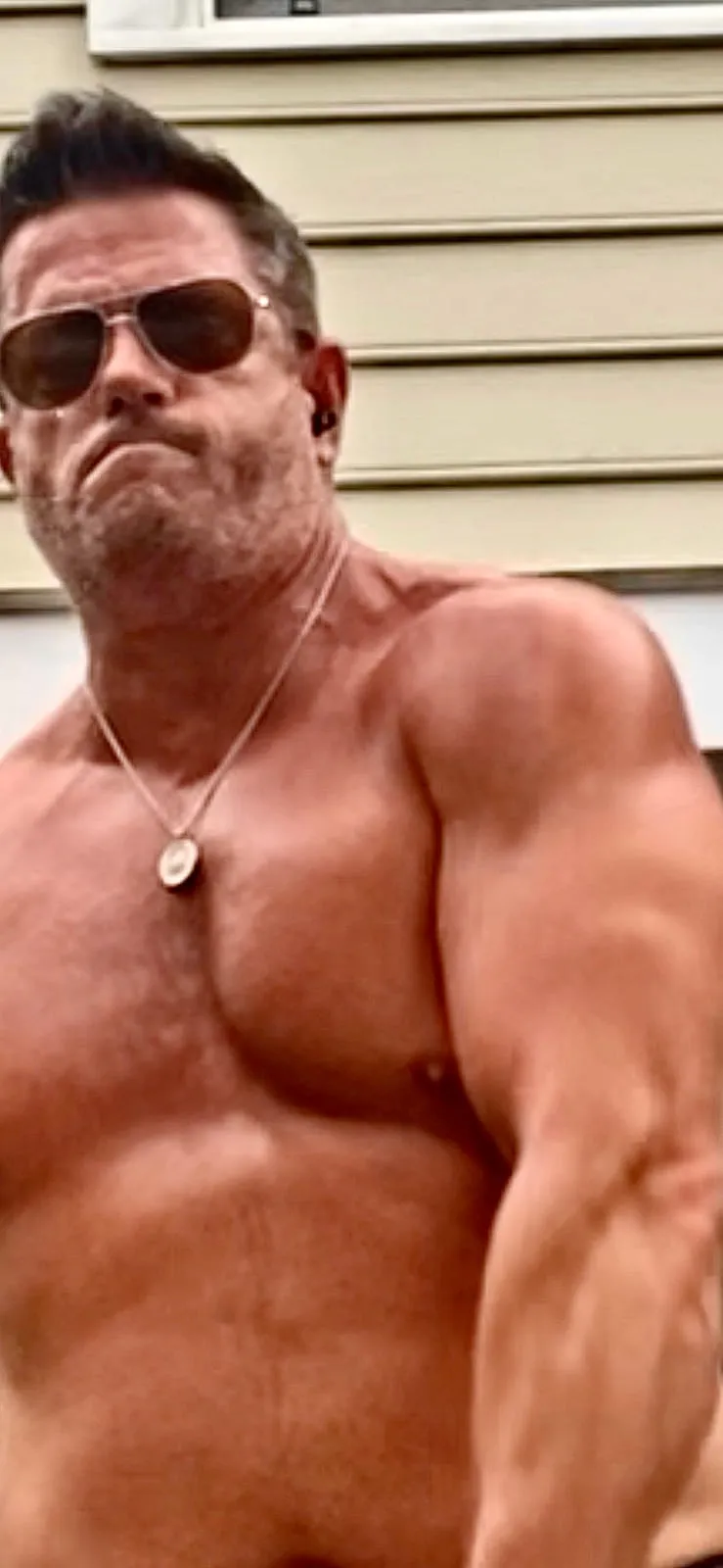 Rob Scott mid-swing during kettlebell training